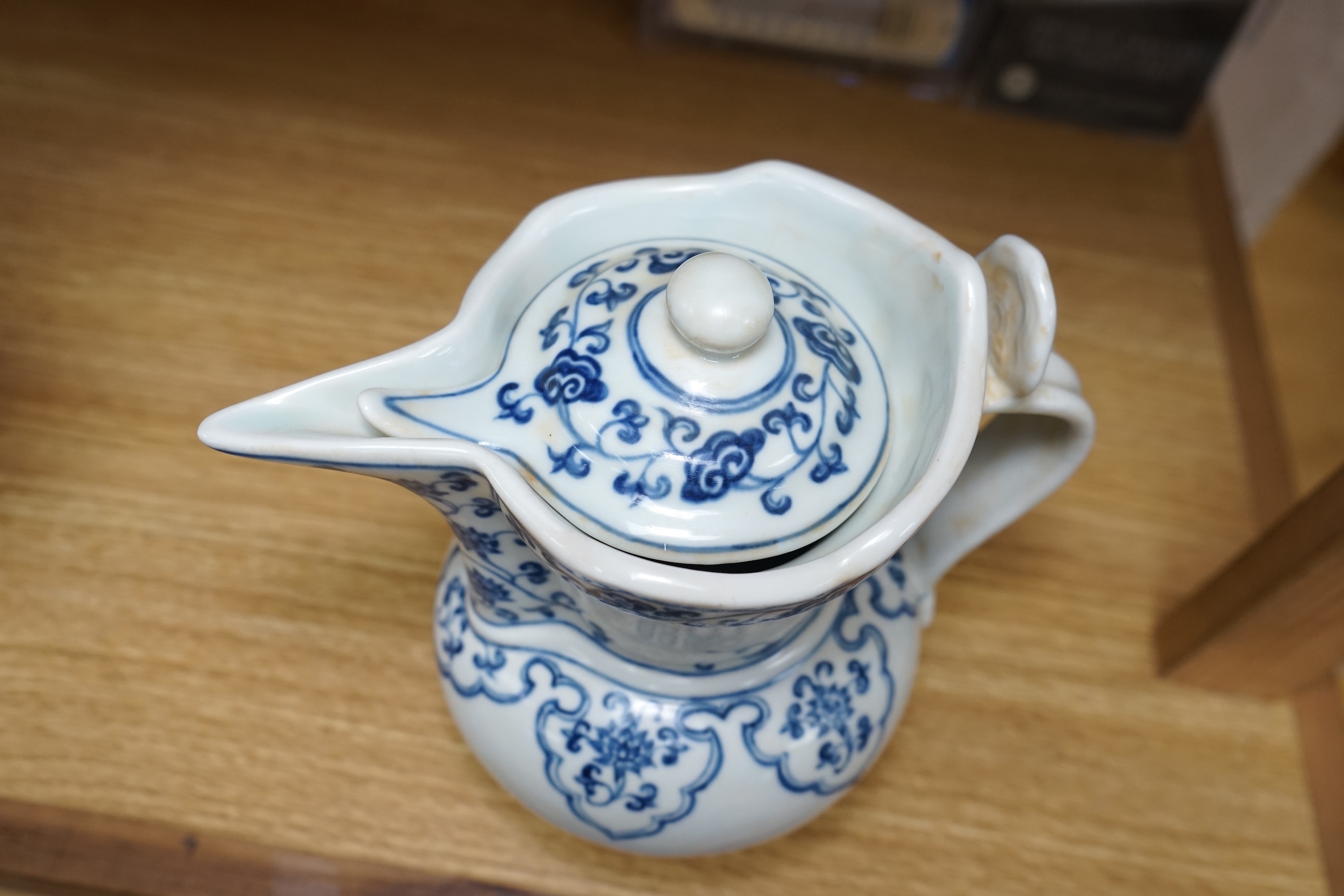 A Chinese blue and white water pot and cover, 19cm. Condition - good